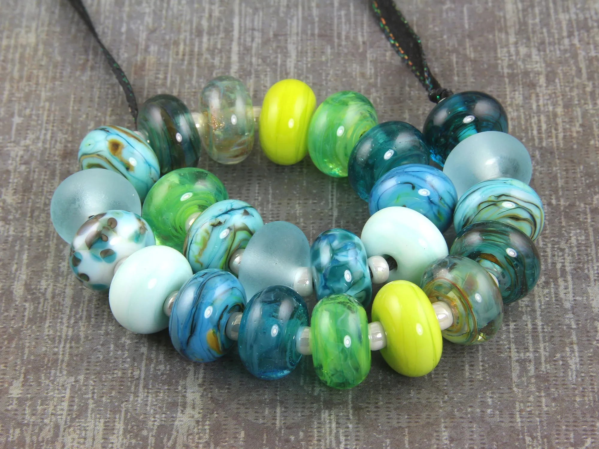 24 Handmade Blue Lagoon Lampwork Beads SRA