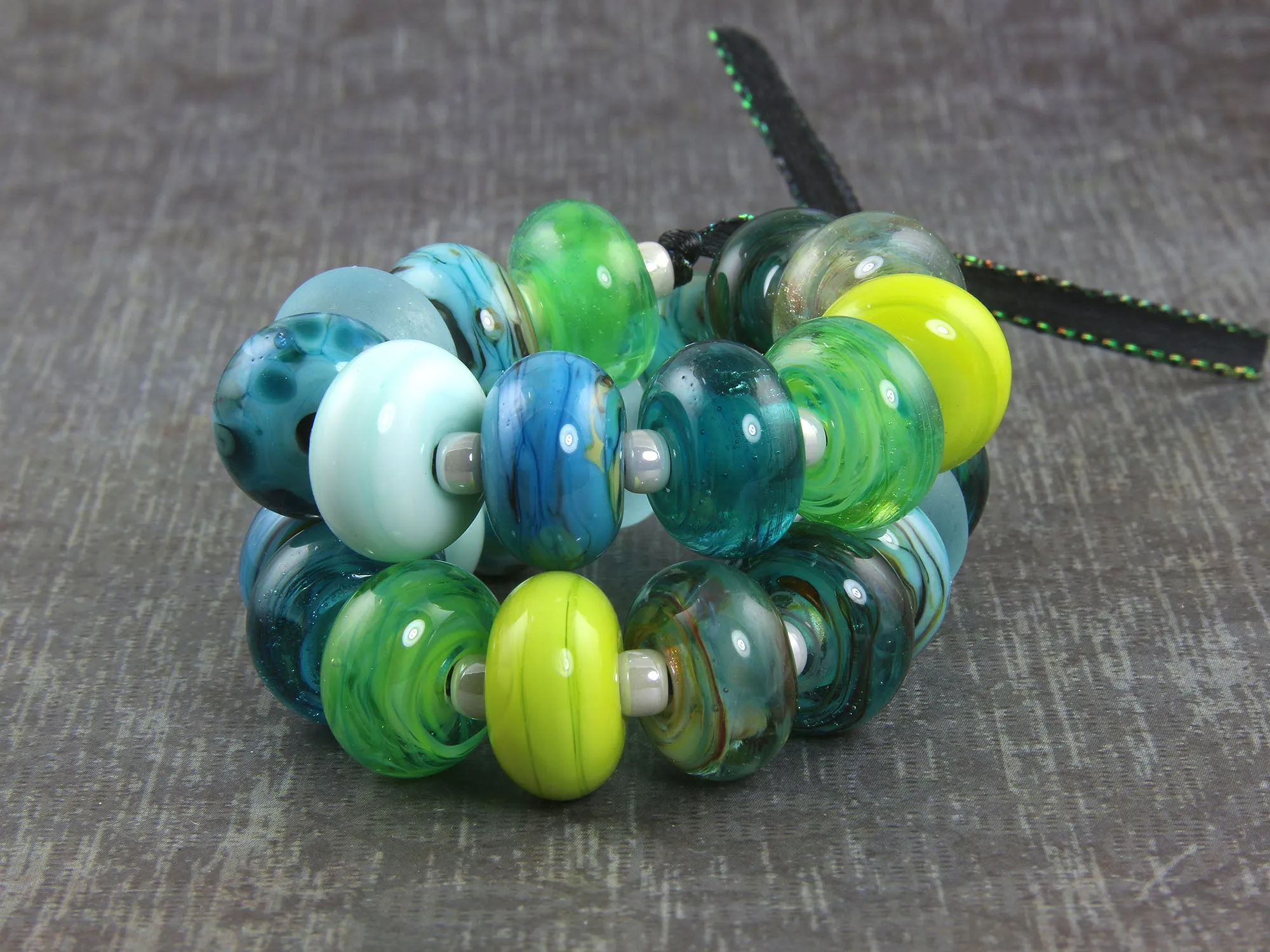 24 Handmade Blue Lagoon Lampwork Beads SRA